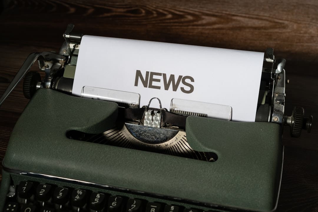 ADA updates — a close up of a typewriter with news paper on it
