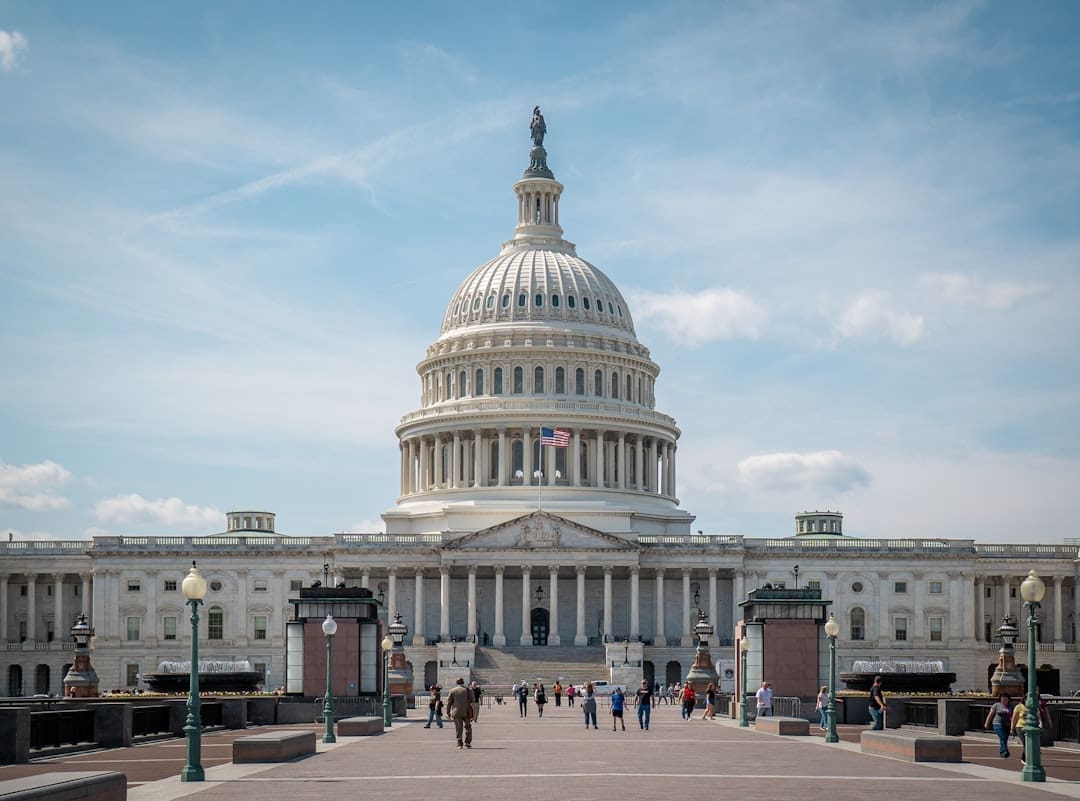 support animal laws — The united states capitol building under a clear blue sky.
