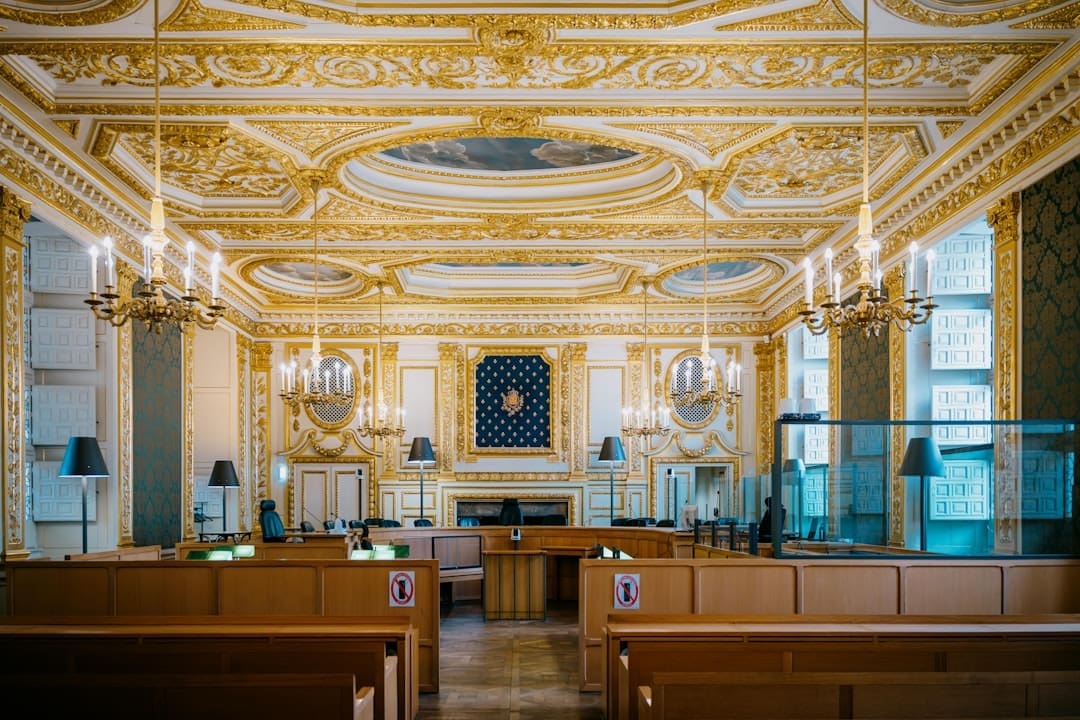 nonprofit mental health — Ornate courtroom with gilded decorations and chandeliers