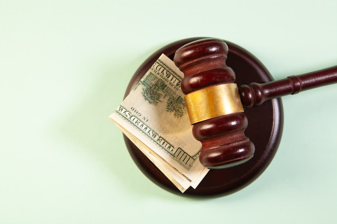 Florida support animal laws — A gavel rests on a sound block with money.