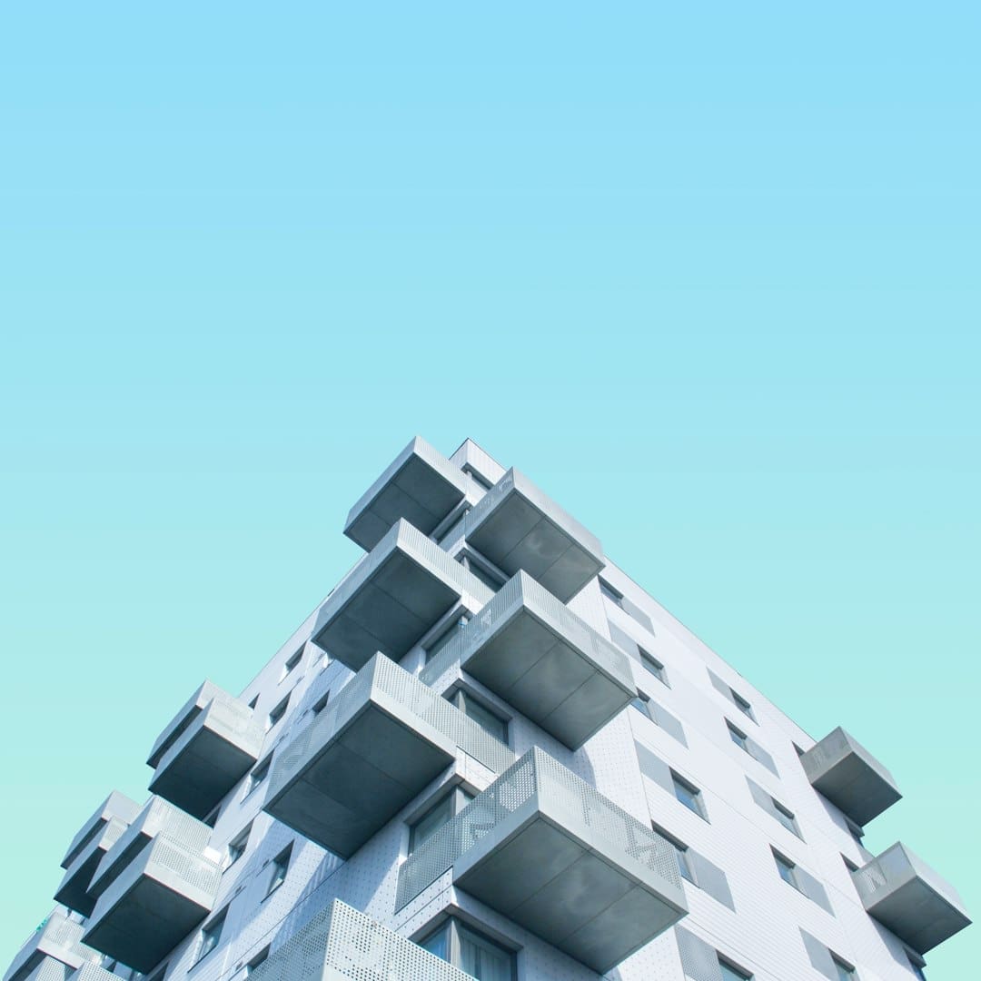 support animal accommodation — low angle photography of concrete building during daytime